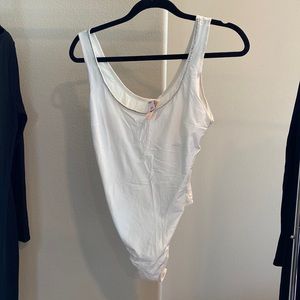 White body suit with gems